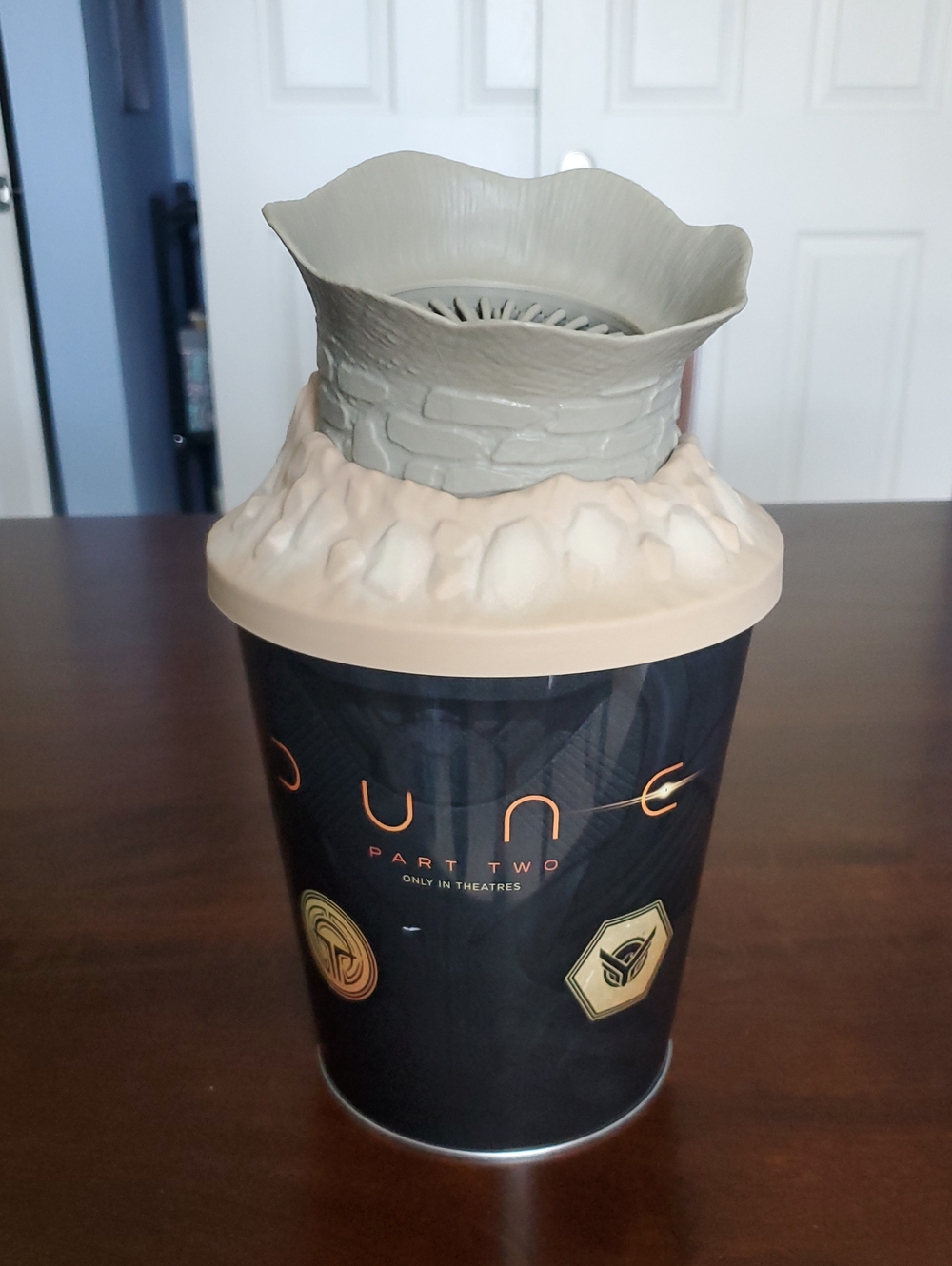Dune 2 Popcorn Bucket. Zinc Metallic Silver Tin Lid with Brown Wood Surface